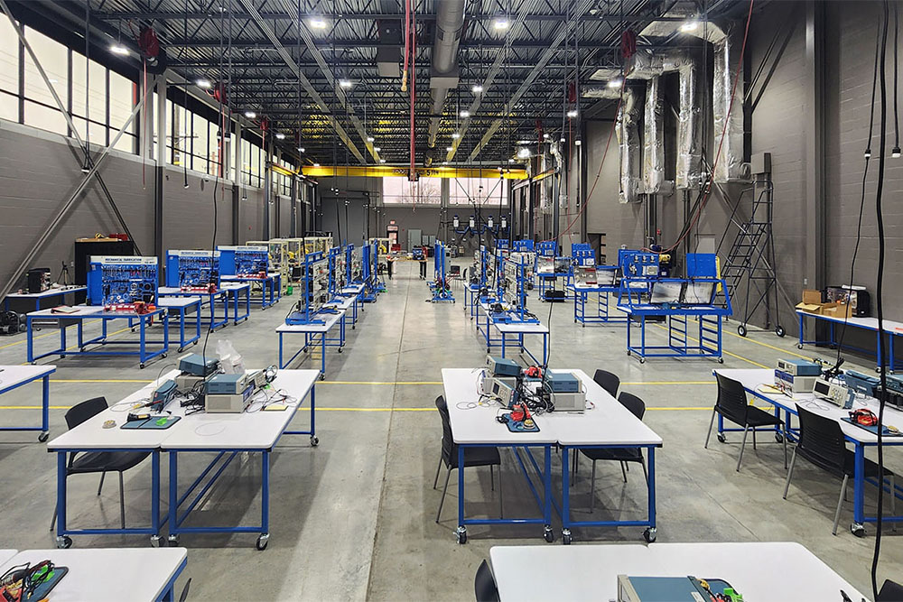 <p>The newly renovated Academy includes Manufacturing High-Bay addition, computer lab, classrooms, robotics lab, offices, lounge, restrooms, and a full chocolate production factory.  The classrooms include training stations for welding, machining, pneumatics, electronics, wiring, and power and controls.  The Confection Connection is a full kitchen with prep area, shipping and packaging area, chocolate lab, dry storage and kitchen storage.</p>